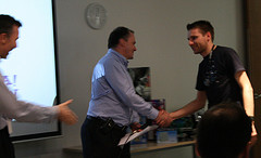 Glen shaking hands with John Linwood at Hack Day